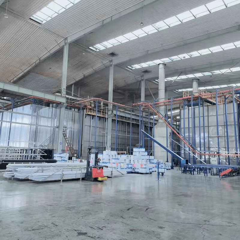 Automated powder coating equipment in operation